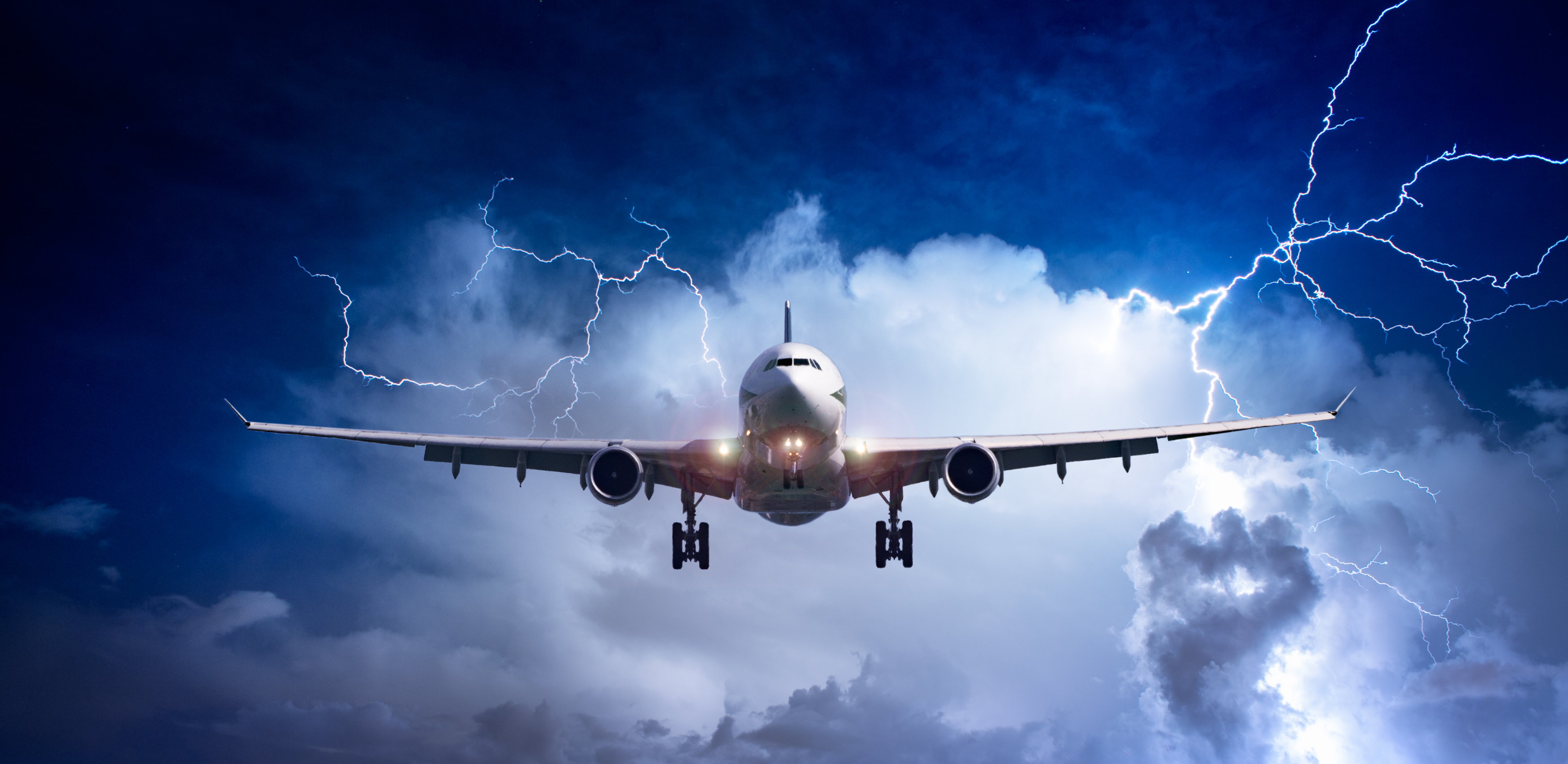 Passenger Airplane Flying Above Sea On Stormy Sky With Dark Clouds And Lightnings.