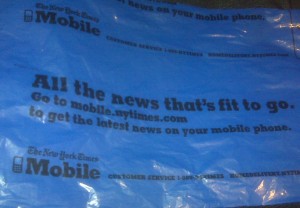Newspaper Bag Promotes "All the News That's Fit to Go"